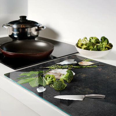 Chopping board Flowers and herbs on a marble background