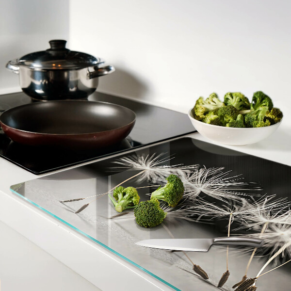 Glass cutting board Fluffy dandelions on a monochromatic background