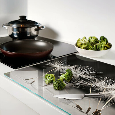Glass cutting board Fluffy dandelions on a monochromatic background