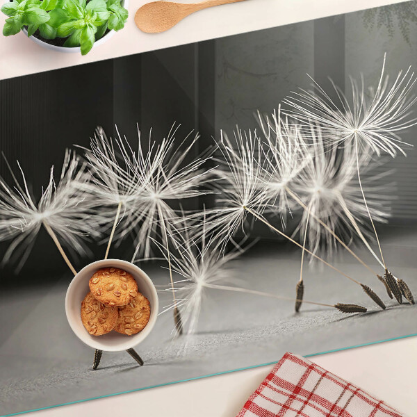 Glass cutting board Fluffy dandelions on a monochromatic background
