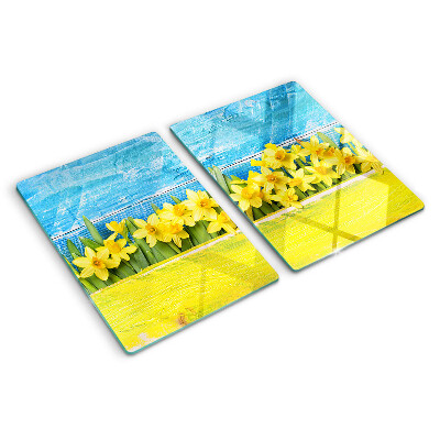 Glass kitchen board Daffodil flowers against the sky