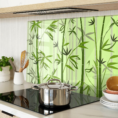Glass kitchen board Bamboo on a green background