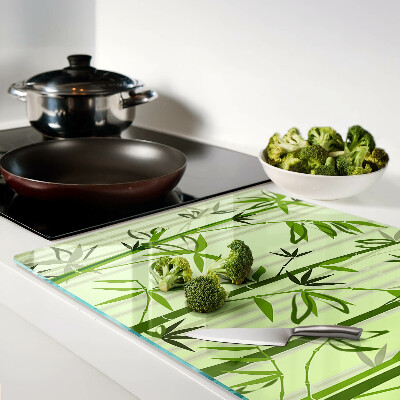 Glass kitchen board Bamboo on a green background