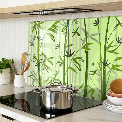 Glass kitchen board Bamboo on a green background