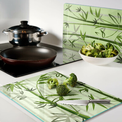 Glass kitchen board Bamboo on a green background