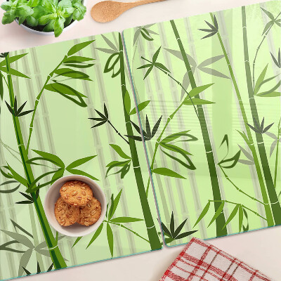 Glass kitchen board Bamboo on a green background