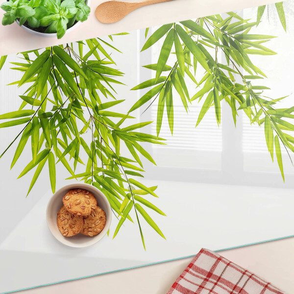 Chopping board Bamboo leaves against the window background