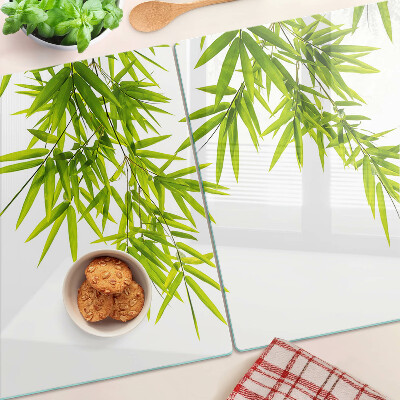Chopping board Bamboo leaves against the window background