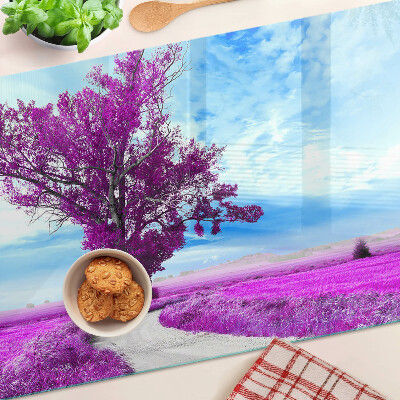 Glass kitchen board A purple tree against the sky
