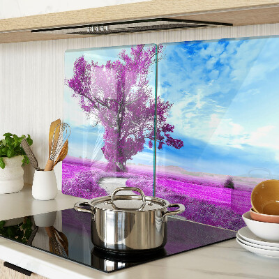 Glass kitchen board A purple tree against the sky