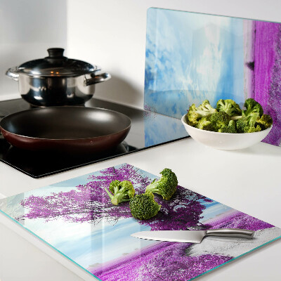 Glass kitchen board A purple tree against the sky