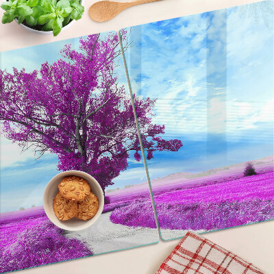 Glass kitchen board A purple tree against the sky