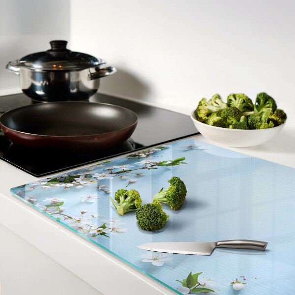Chopping board glass Floral pattern on a blue background