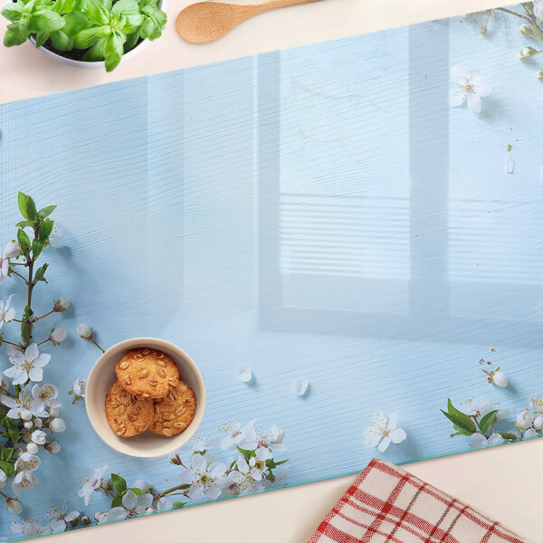 Chopping board glass Floral pattern on a blue background