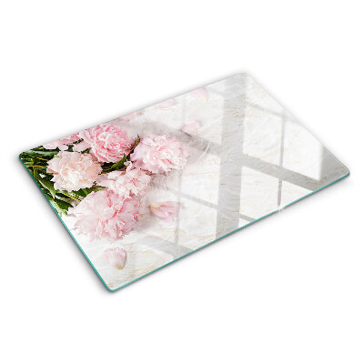 Glass cutting board Peony flowers on a marble background