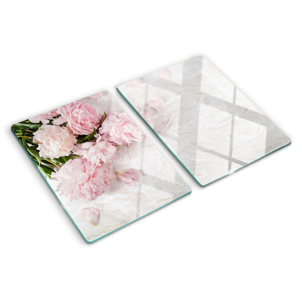 Glass cutting board Peony flowers on a marble background