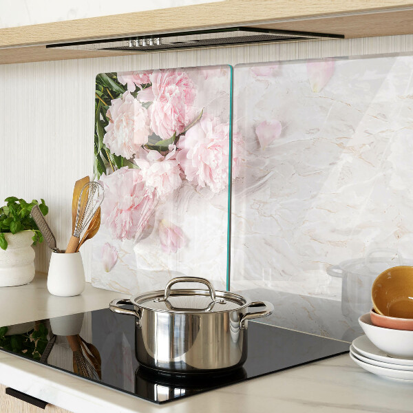 Glass cutting board Peony flowers on a marble background