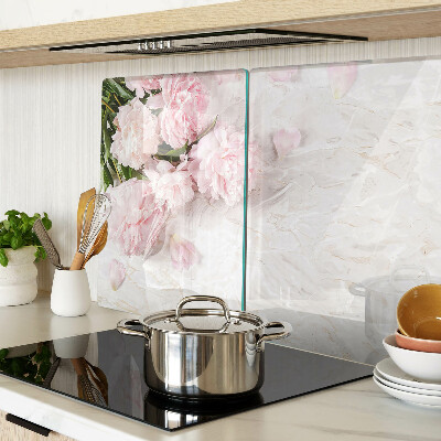 Glass cutting board Peony flowers on a marble background