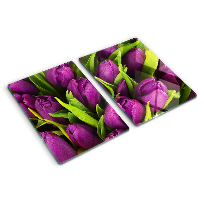 Glass kitchen board Purple tulips with green leaves