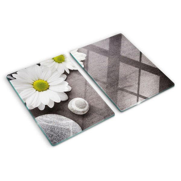 Chopping board Flowers and stones in the background