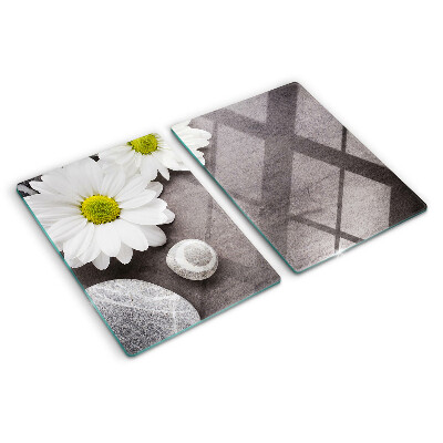 Chopping board Flowers and stones in the background