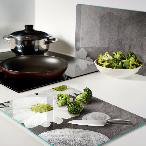 Chopping board Flowers and stones in the background