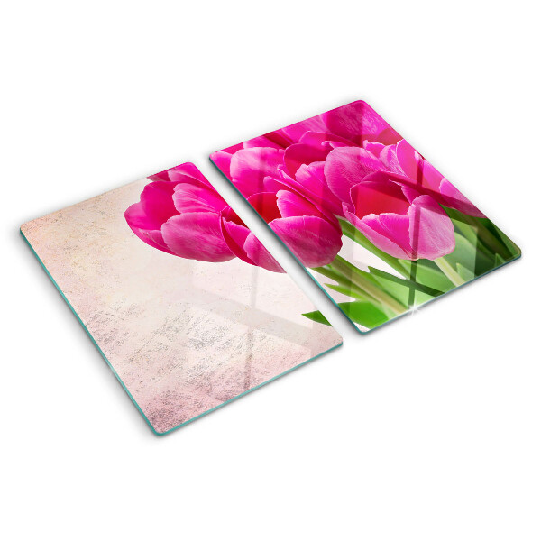 Glass chopping board Tulip flowers on a pink background