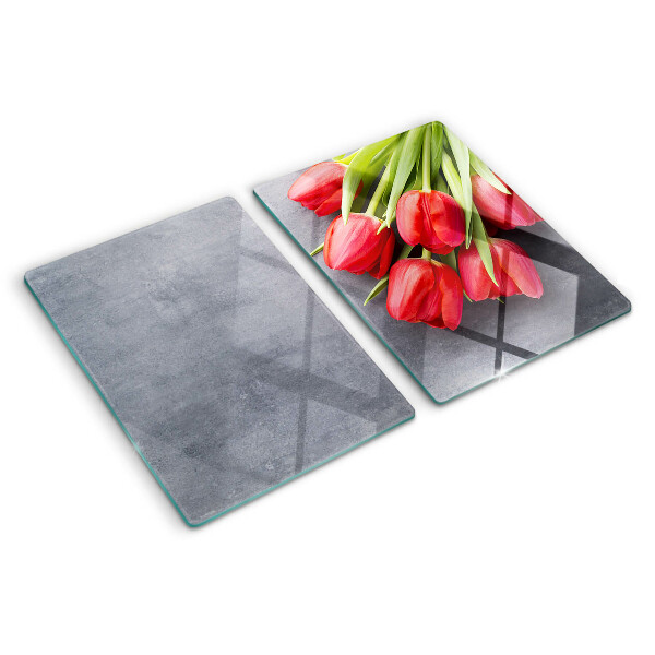 Glass cutting board Tulips on a gray background