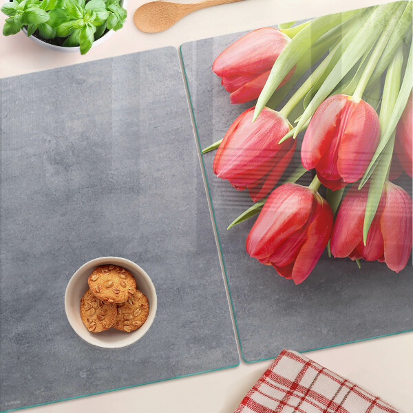 Glass cutting board Tulips on a gray background