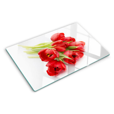 Glass kitchen board Red tulips on a white background