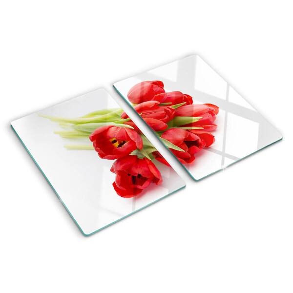 Glass kitchen board Red tulips on a white background