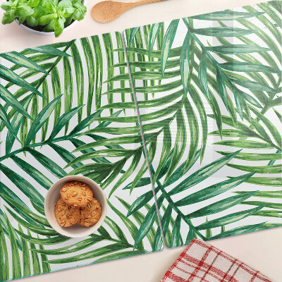 Glass kitchen board Palm leaves in shades of green