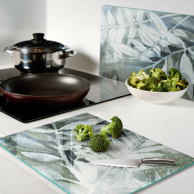 Glass cutting board Tropical leaves in pastel shades