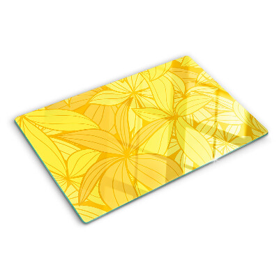 Chopping board glass Yellow leaves in a tropical style