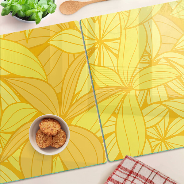 Chopping board glass Yellow leaves in a tropical style
