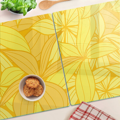 Chopping board glass Yellow leaves in a tropical style