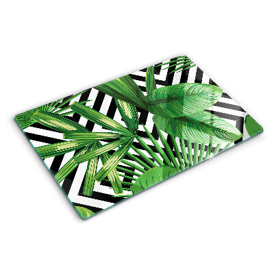 Glass kitchen board Tropical leaves on stripes
