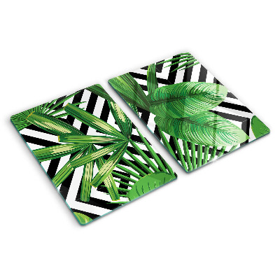 Glass kitchen board Tropical leaves on stripes
