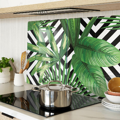 Glass kitchen board Tropical leaves on stripes