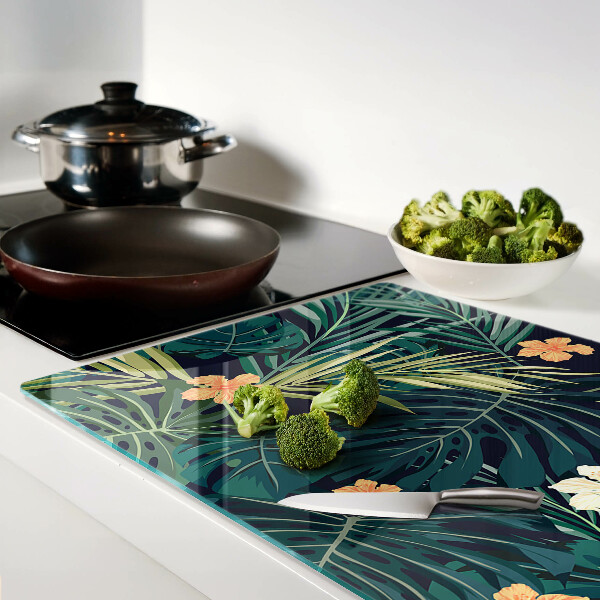 Glass kitchen board Tropical pattern with leaves and flowers