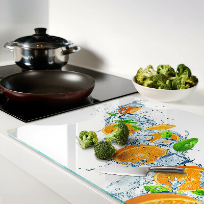 Chopping board Citrus fruits in water