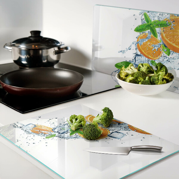 Chopping board Citrus fruits in water