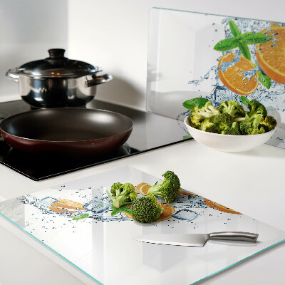 Chopping board Citrus fruits in water