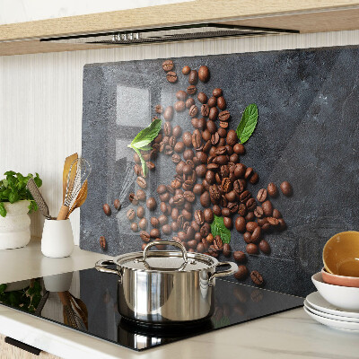 Chopping board glass Coffee beans on a stone background