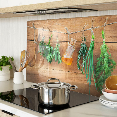 Glass chopping board Herbs in the kitchen