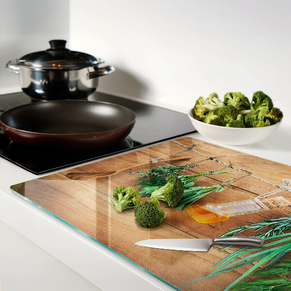 Glass chopping board Herbs in the kitchen