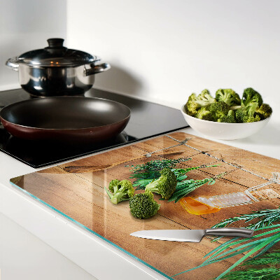 Glass chopping board Herbs in the kitchen