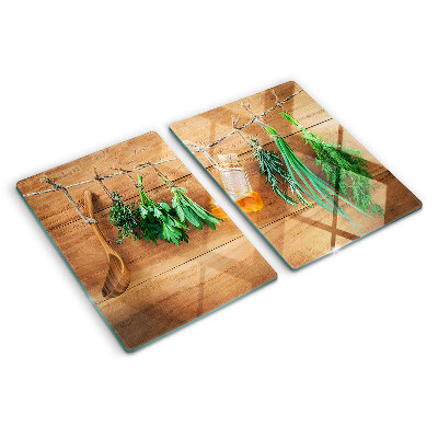 Glass chopping board Herbs in the kitchen