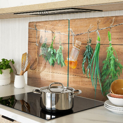 Glass chopping board Herbs in the kitchen