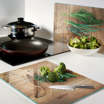 Glass chopping board Herbs in the kitchen